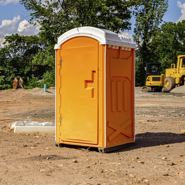 what is the cost difference between standard and deluxe portable restroom rentals in Alum Bank